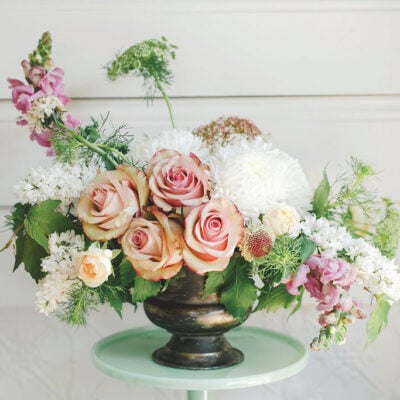 Renaissance style floral arrangement with vase