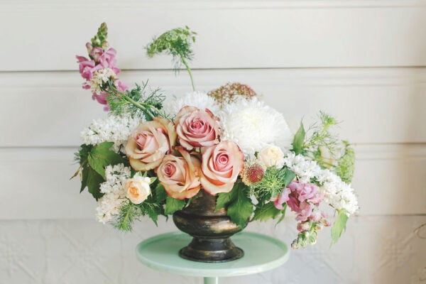 Renaissance style floral arrangement with vase